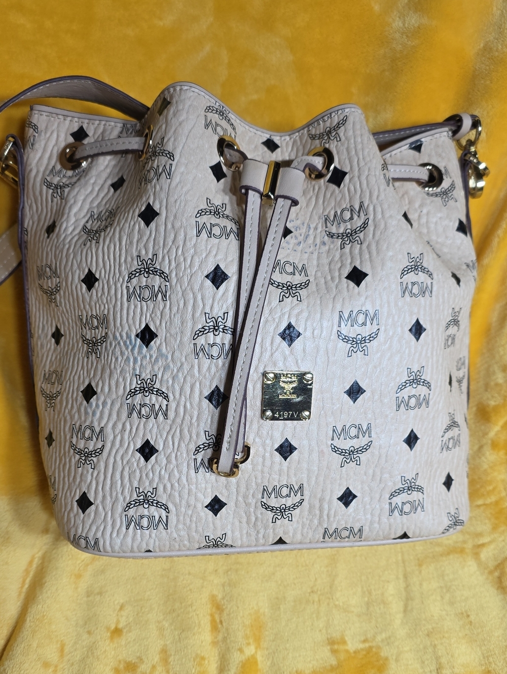 Authentic MCM White Logo Drawstring Bucket Shoulder Bag with Gold Hardware